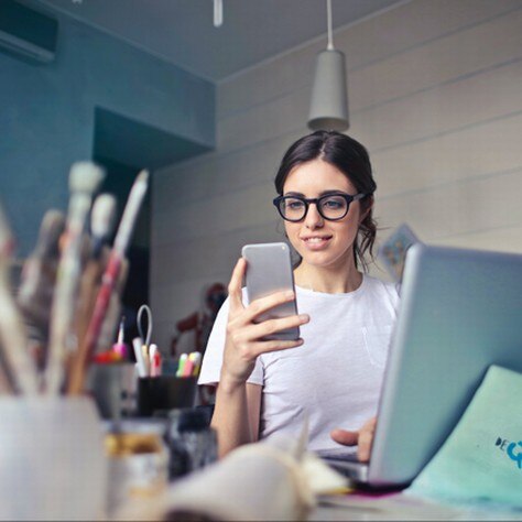 Woman looking at her cellular