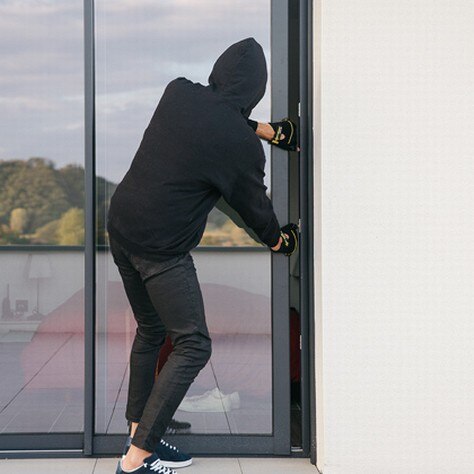 someone trying to enter a house